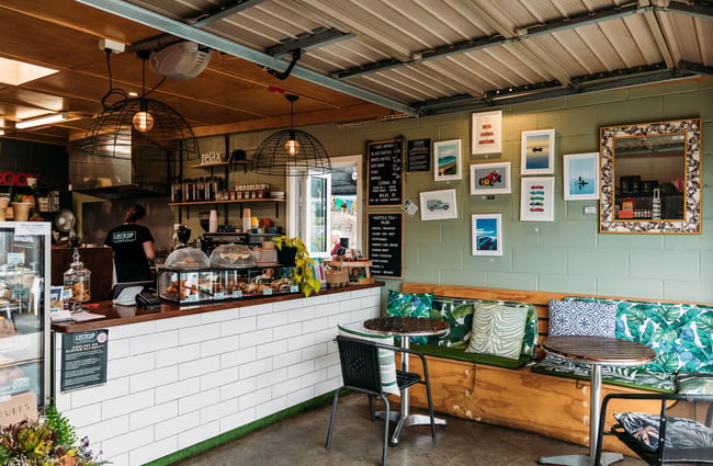 The seating and ordering area inside a cafe.