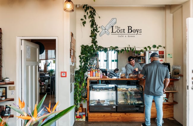A customer at the counter inside The Lost Boys, Hamilton.