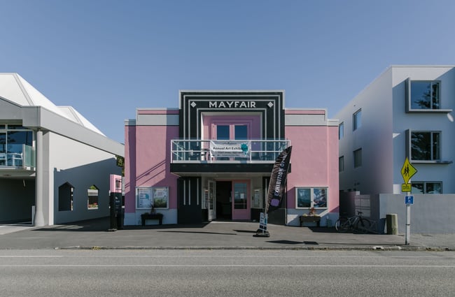 Bright pink exterior of The Mayfair.