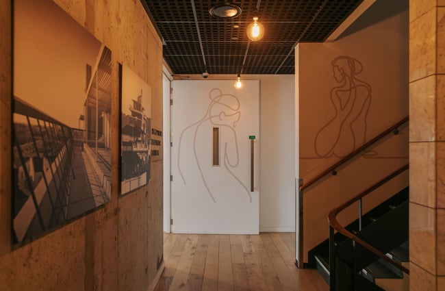 A hallway inside The Muse Art Hotel.