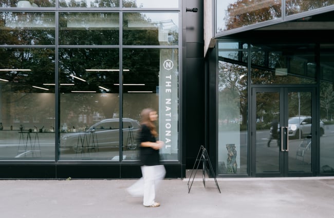 Person walking past exterior of The National gallery in Christchurch