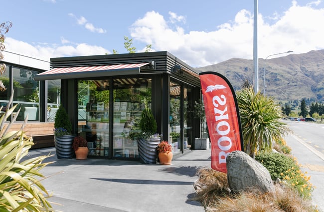 The outside of The Next Chapter, Wānaka on a sunny day.