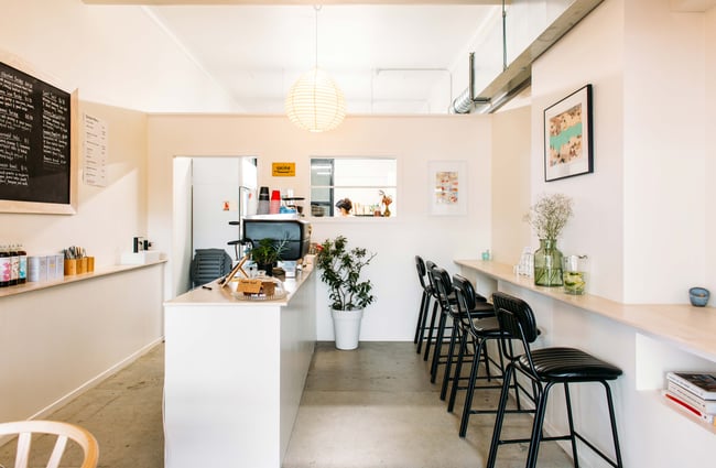 Interior view of the pristine walls and minimalism interior at The Oatery.