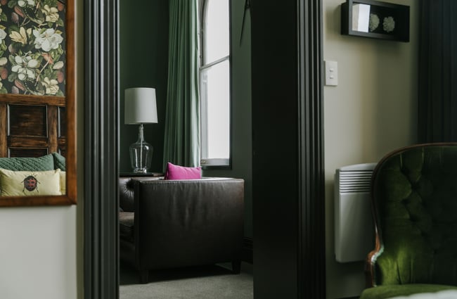 A view of the lounge from inside a bedroom at The Old Confectionery Oamaru.