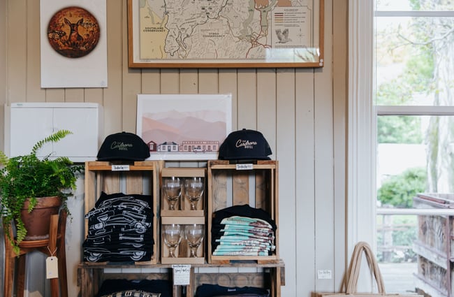 Caps and t-shirts on display.