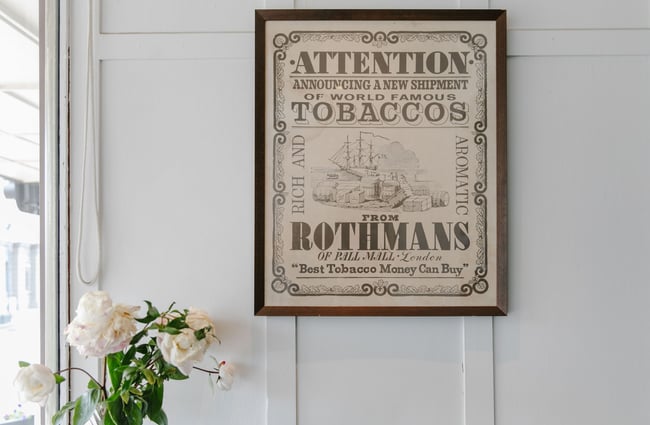 Close up of an old tobacco sign on a wall at The Oxford restaurant in Timaru.