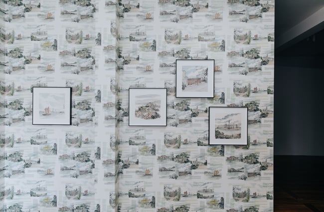 Close up of art on a wall.