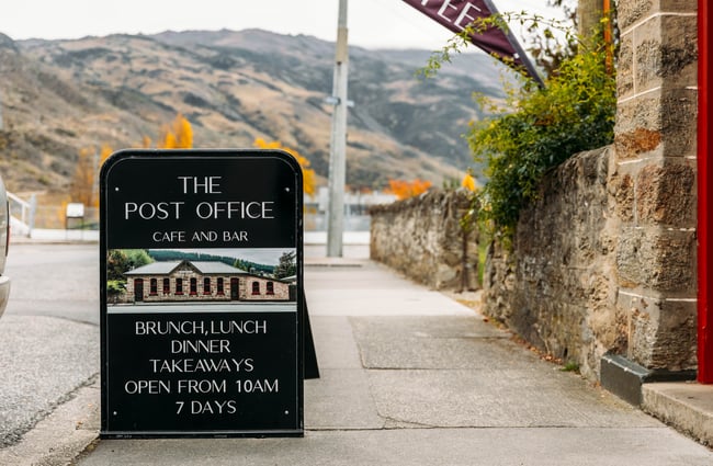 Signage for The Post Office Cafe and Bar.