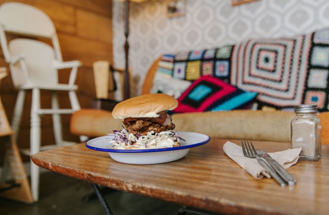 Close up of a burger on a table at The Running Duck cafe in Geraldine.