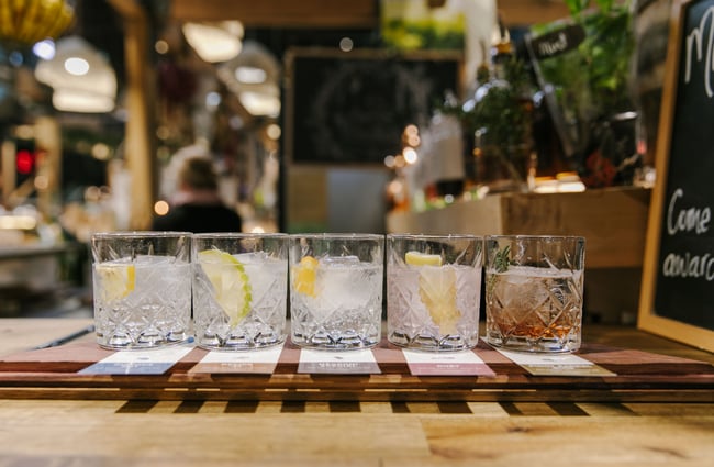 Glasses with different gins as part of Curiosity gin flight at Riverside Market.