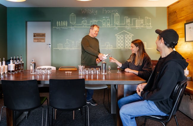 Couple engaging in a tasting experience at The Spirits Workshop.