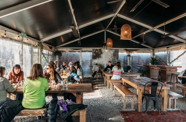 A covered seated area at The Stoaker.