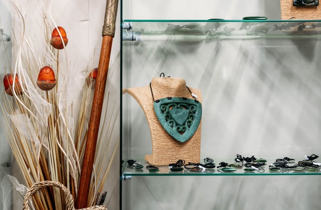A pounamu necklace on display.