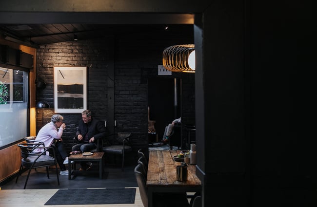 Customers sitting and drinking.