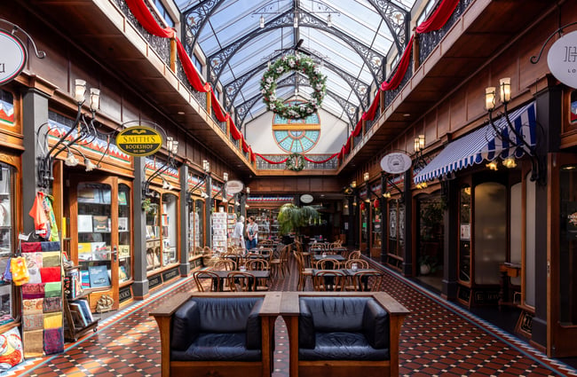 Several shop entrances can be seen from the atrium in The Tannery.