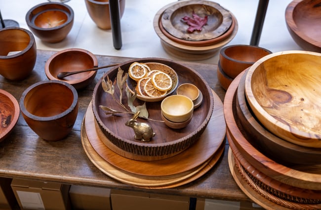 Wooden servingware on display in a shop at The Tannery.