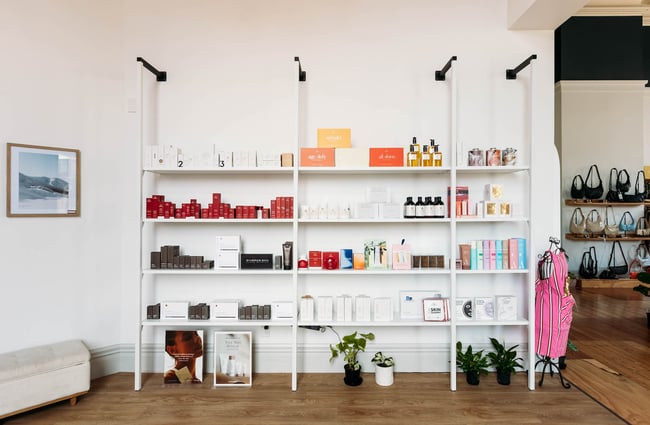 Large shelf of make-up and skincare products