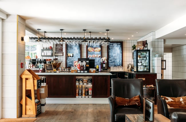 The restaurant and counter inside a large bar area.
