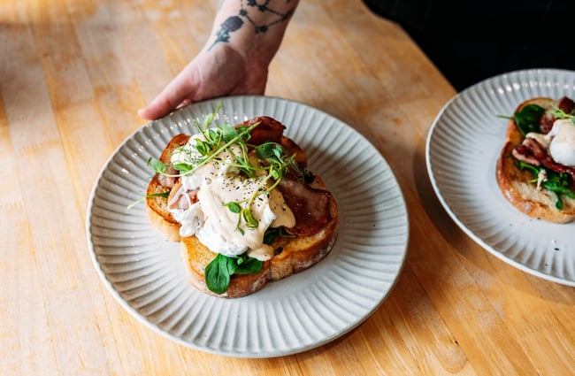 A plate of eggs on toast on a table at Three High Street cafe in Rangitikei.