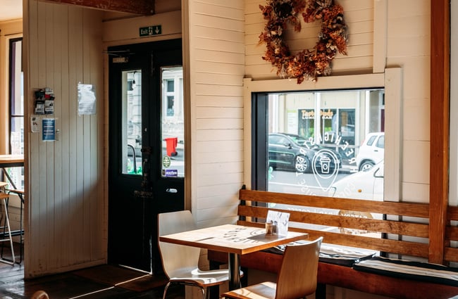 Seating at the window inside Three High Street cafe in Rangitikei.