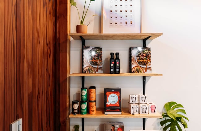 Cafe items on floating shelves.