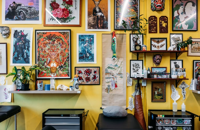 Tattoo art on the walls at Three Rabbits Tattoo.