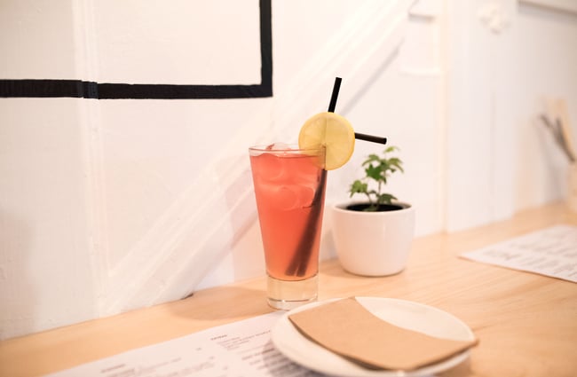 Pink drink on the table.