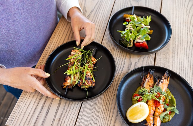 Close up of Japanese skewers on plates at Tini Bar in Akaroa