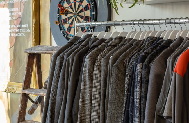 Menswear blazers on a rack at To Be Continued.