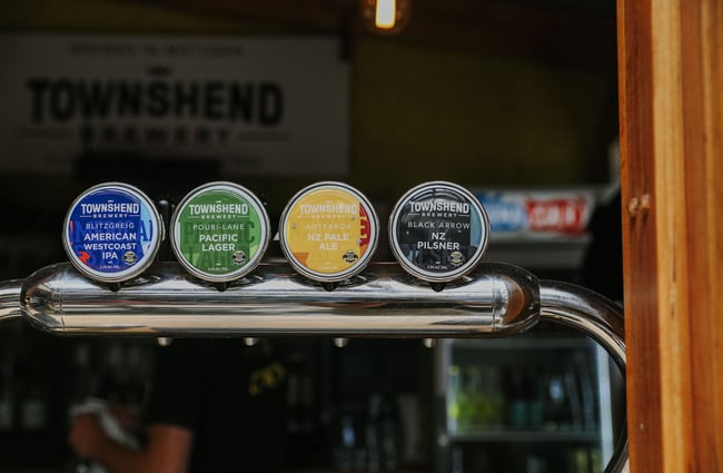 Close up of beer taps at Toad Hall, Motueka.