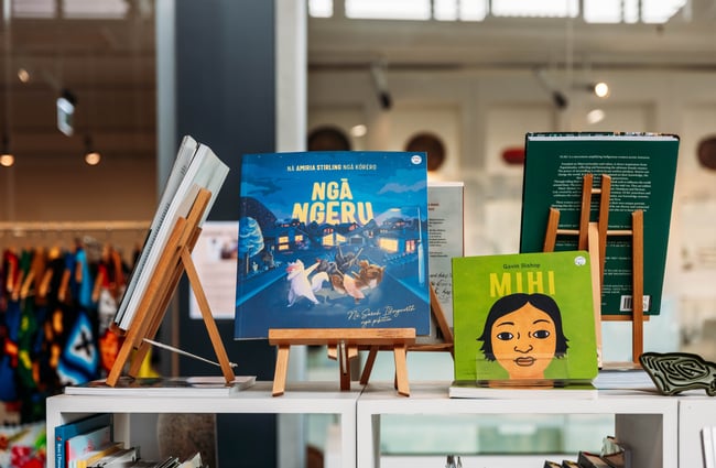 A close up of Maori language books.