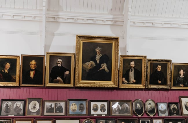 Portraits on a wall.