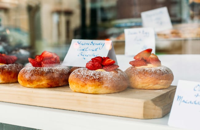 Close up of donuts with fresh strawberries from Tomboy, Wellington.