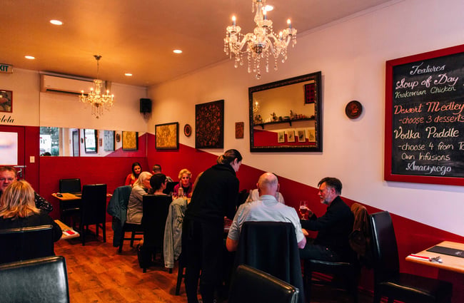 Dining room with customers at Topor.