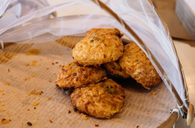 Close up of cheese scones on a cafe counter