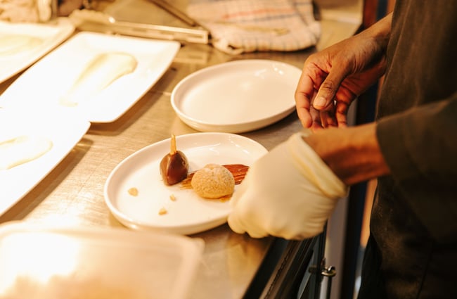 Chef preparing dessert.