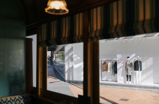 Looking out tram window.