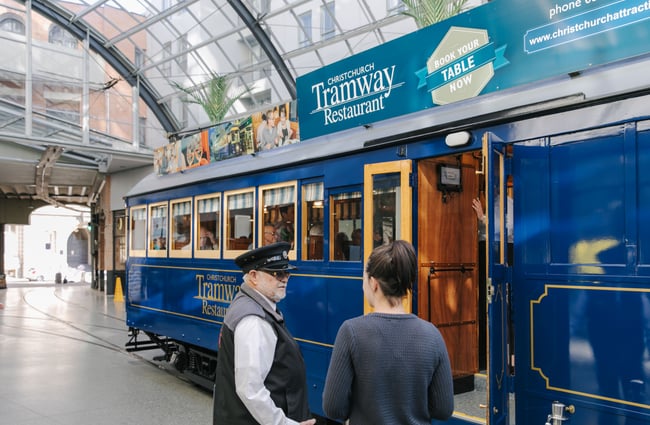 People standing outside the tramway restaurant.