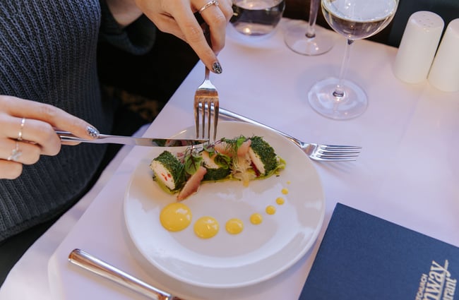 Woman about to eat meal.