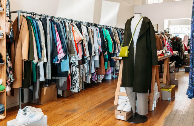 Clothing on display inside a retail display.