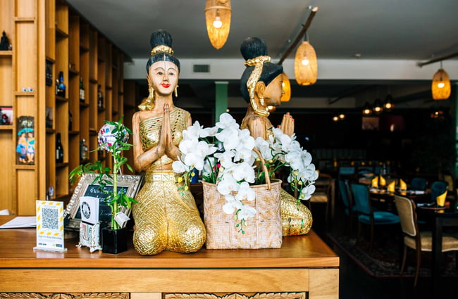 Thai statues on the counter at Tuk Tuk Thai.