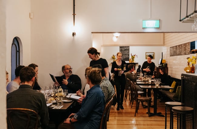 Customers dining inside the restaurant.