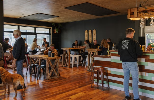 Customers enjoying drinks and food at Two Thumb Brewing Co. Redcliffs.