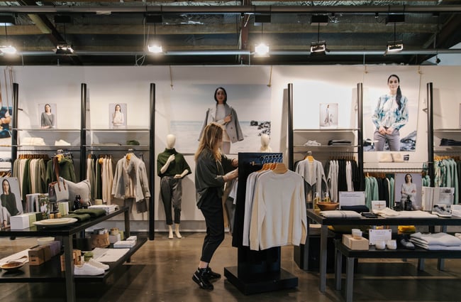 Woman browsing the clothing.