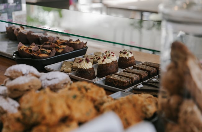 Sweet treats and cakes in the cabinet at Vanguard, Dunedin.