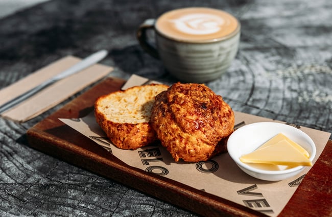 Cheese scone and coffee at Velo Café & Beer Garden.