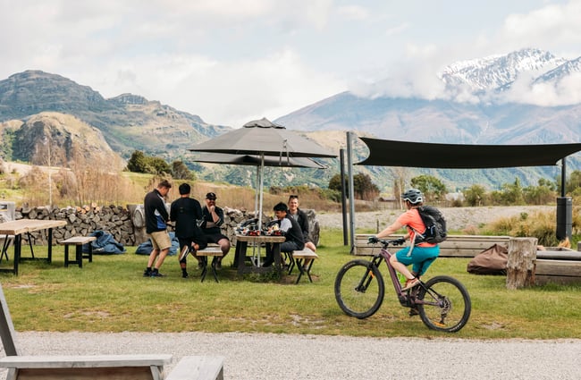 Cyclists enjoying the view and outside area at Velo Café & Beer Garden.