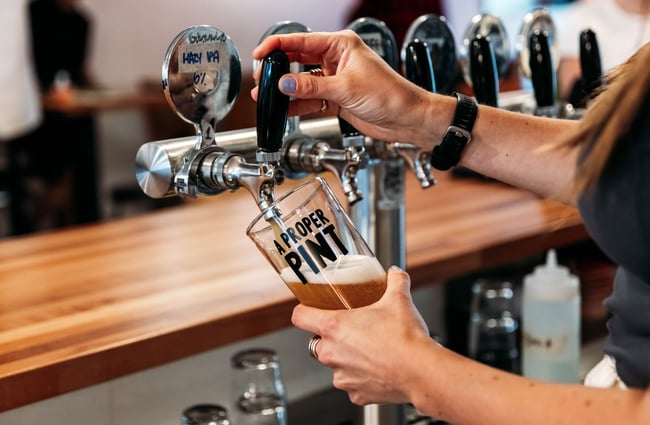 Bartender pouring a pint at Verve.