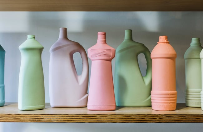 Colourful bottles on a shelf.
