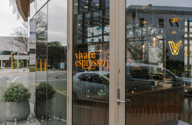 Front door with signage at Vivace Espresso.